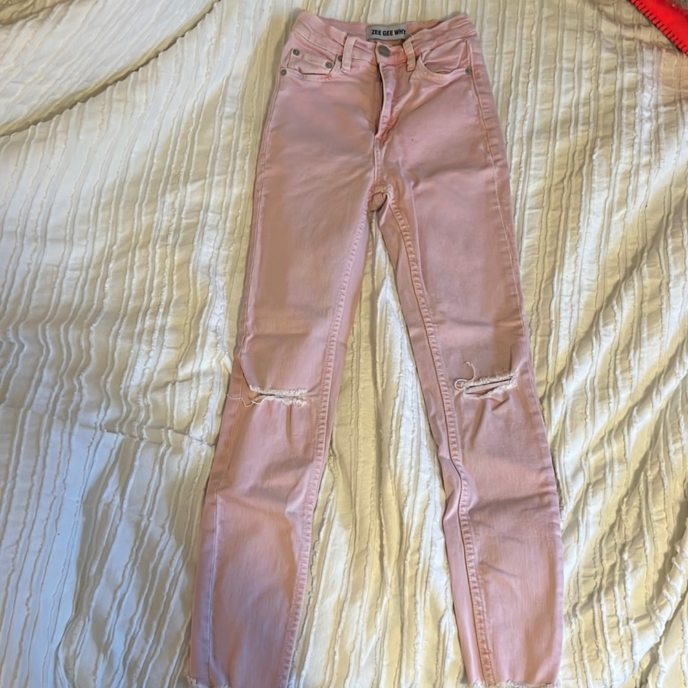 See Gee Why pink skinny jeans with rips in knees size 24